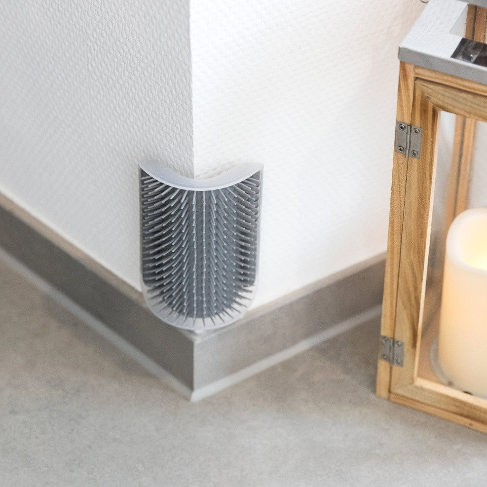 Brosse d'auto-toilettage d'angle